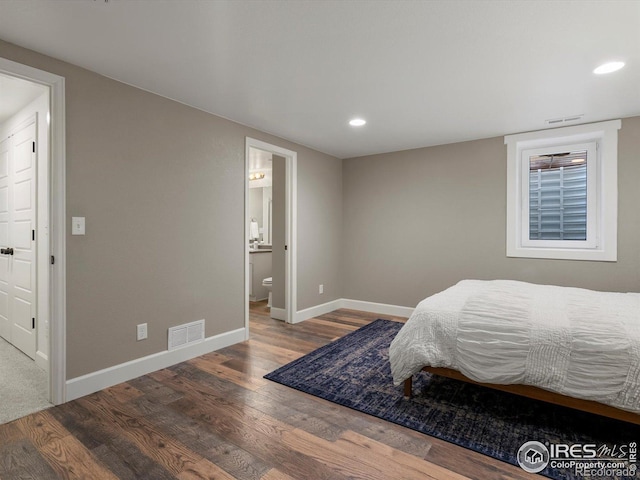 950 Sumner Way, Erie, CO 80516 - bedroom featuring wood finished floors, baseboards, recessed lighting, and ensuite bathroom