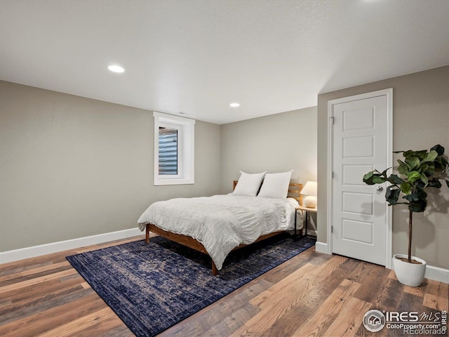 950 Sumner Way, Erie, CO 80516 - bedroom featuring baseboards, wood finished floors, and recessed lighting