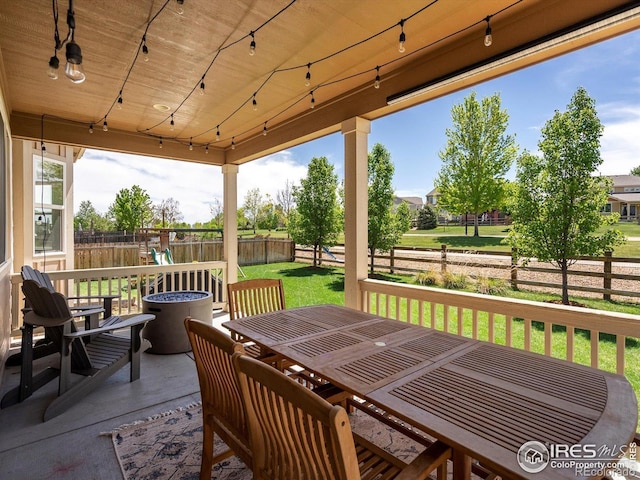 950 Sumner Way, Erie, CO 80516 - view of patio / terrace featuring outdoor dining space and a playground