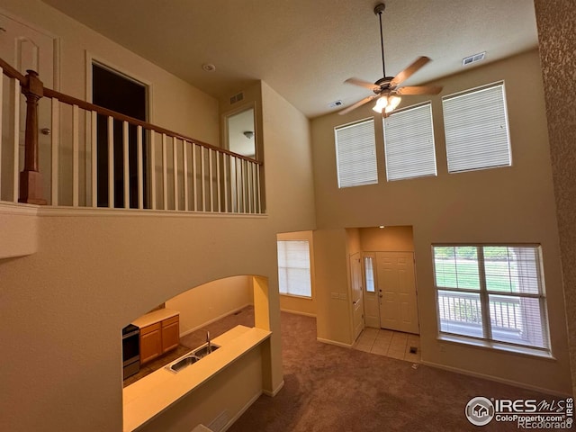 6608 W 3rd St Unit 35-58, Greeley, CO 80634 - carpeted foyer entrance with a ceiling fan and baseboards