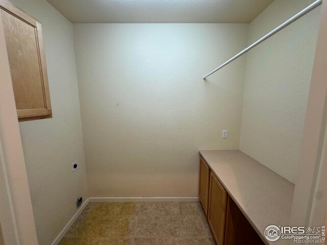 6608 W 3rd St Unit 35-58, Greeley, CO 80634 - clothes washing area featuring electric dryer hookup and baseboards