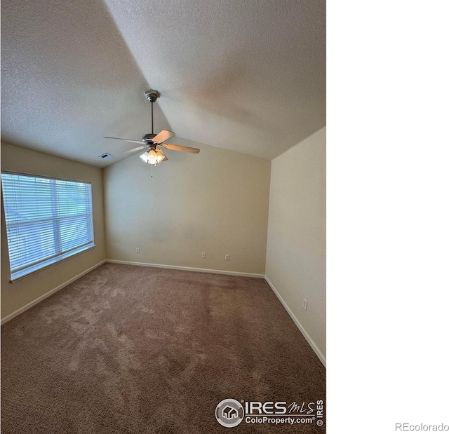 6608 W 3rd St Unit 35-58, Greeley, CO 80634 - carpeted empty room with a ceiling fan, a textured ceiling, vaulted ceiling, and baseboards