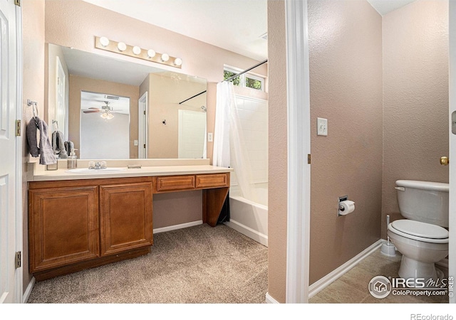 full bath with toilet, vanity, shower / tub combo, a ceiling fan, and baseboards