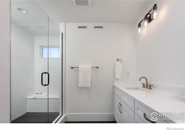 1611 Poplar Dr, Erie, CO 80516 - full bath with a shower stall, vanity, and baseboards