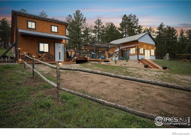 1095 Spruce Mountain Dr, Drake, CO 80515 - view of front facade featuring a deck and a pergola