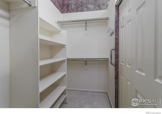 2409 Rock Creek Dr, Fort Collins, CO 80528 - spacious closet featuring carpet flooring