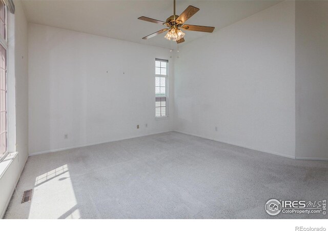 2409 Rock Creek Dr, Fort Collins, CO 80528 - carpeted spare room featuring ceiling fan and baseboards