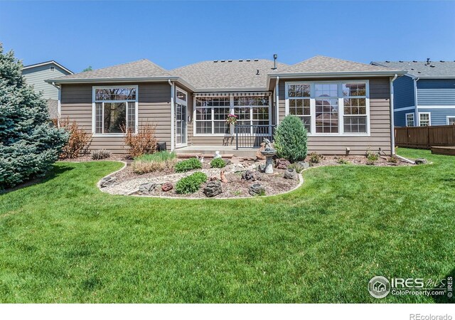 2409 Rock Creek Dr, Fort Collins, CO 80528 - back of house featuring a patio area and a shingled roof