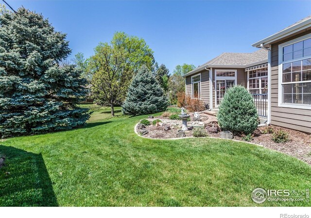 2409 Rock Creek Dr, Fort Collins, CO 80528 - view of green lawn