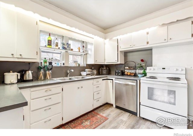 2315 Spruce St, Boulder, CO 80302 - kitchen with white electric range, stainless steel dishwasher, a sink, light wood finished floors, and white cabinetry