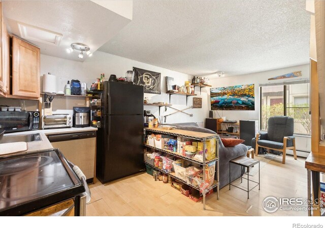 2315 Spruce St, Boulder, CO 80302 - kitchen with freestanding refrigerator, electric range, dishwasher, light wood-style flooring, and a textured ceiling