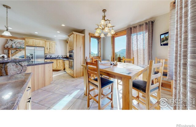 1049 Pine Knoll Dr, Estes Park, CO 80517 - dining room with a chandelier and recessed lighting