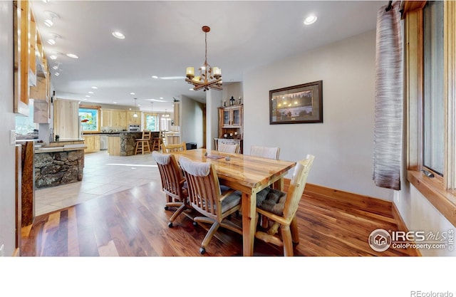 1049 Pine Knoll Dr, Estes Park, CO 80517 - dining room featuring a chandelier, recessed lighting, light wood finished floors, and baseboards