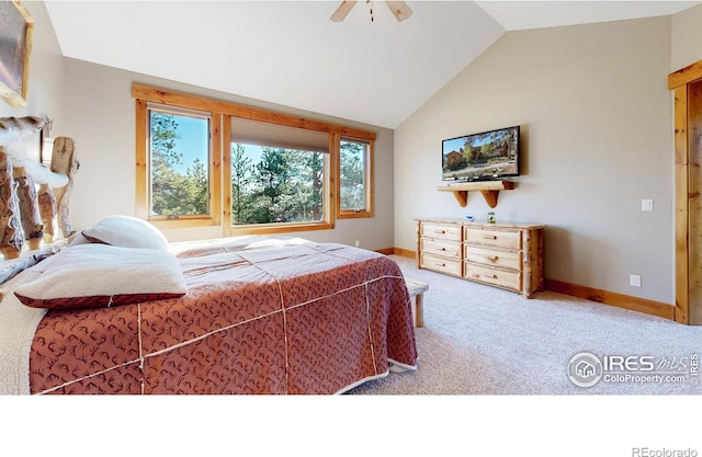 1049 Pine Knoll Dr, Estes Park, CO 80517 - carpeted bedroom with vaulted ceiling, baseboards, and a ceiling fan