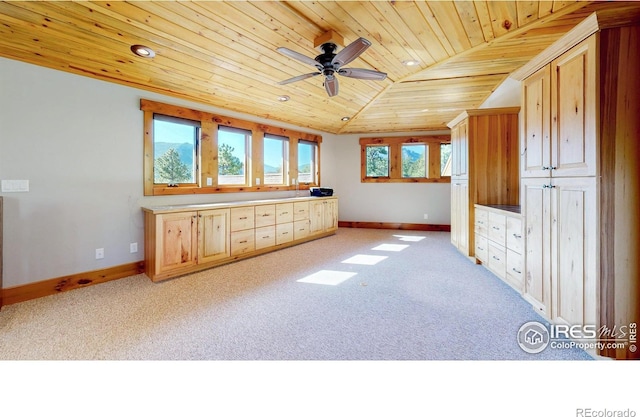 1049 Pine Knoll Dr, Estes Park, CO 80517 - unfurnished room featuring wooden ceiling, healthy amount of natural light, light colored carpet, a ceiling fan, and lofted ceiling