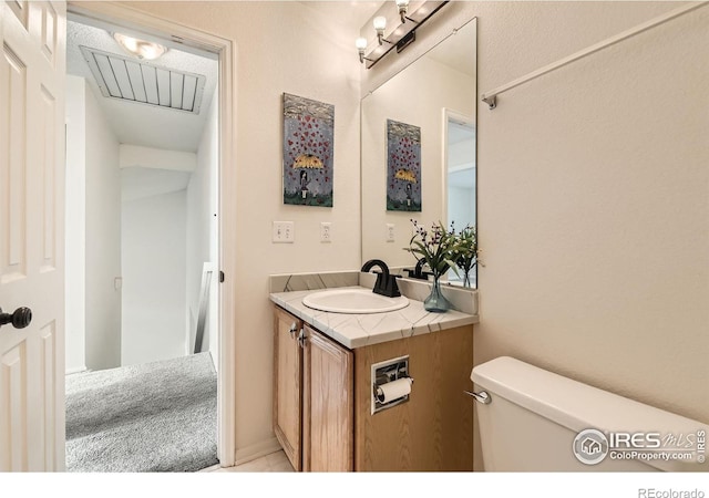 1842 Reliance Cir, Superior, CO 80027 - half bathroom featuring vanity and toilet