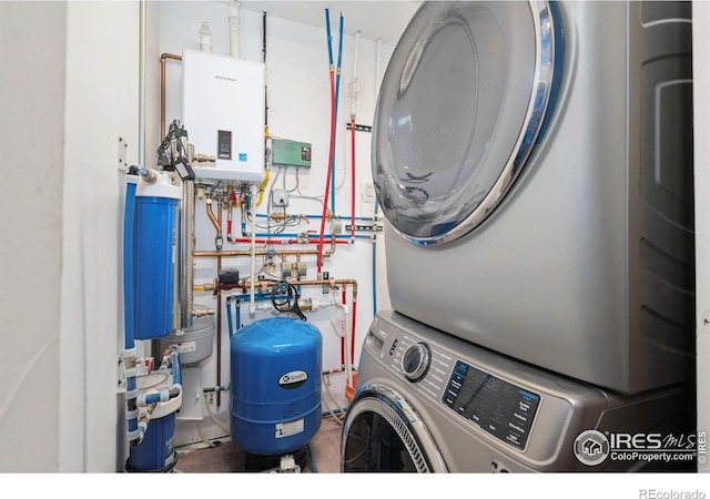 200 Falls Creek Dr, Bellvue, CO 80512 - washroom featuring stacked washer and clothes dryer and water heater