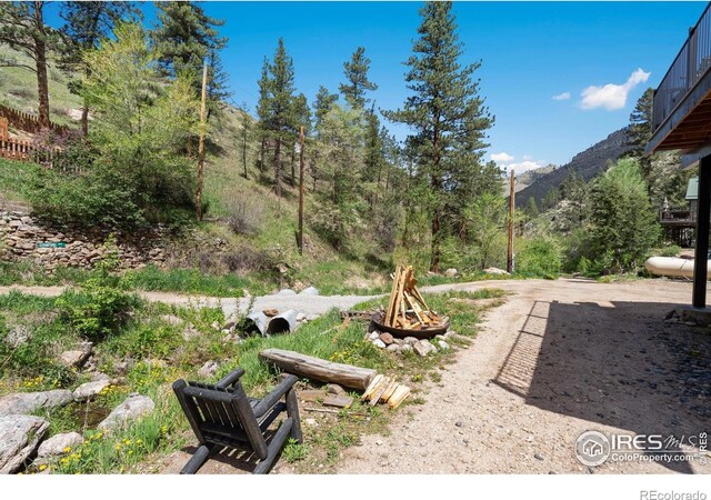 200 Falls Creek Dr, Bellvue, CO 80512 - view of yard featuring a mountain view