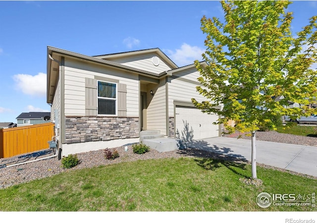 view of front of property with stone siding, concrete driveway, and a garage