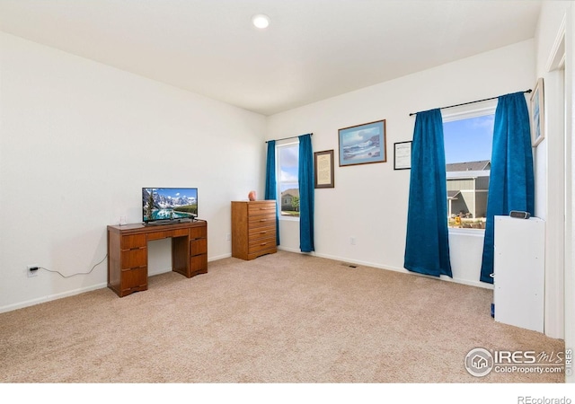 unfurnished bedroom featuring carpet, baseboards, and recessed lighting