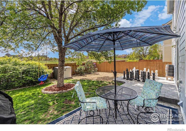 view of patio with central AC unit
