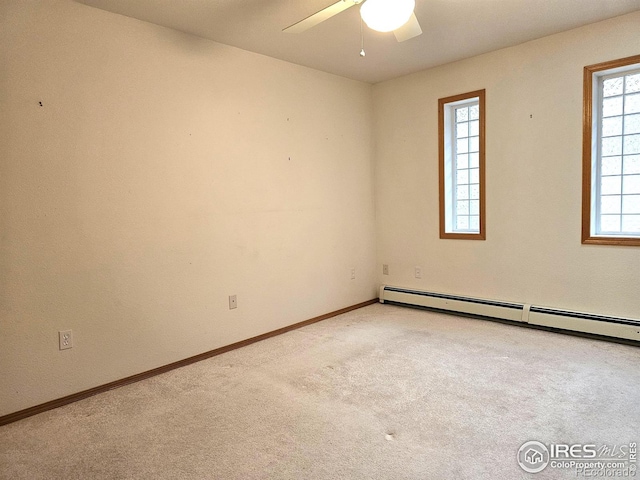 107 Fairway Ln, Fort Morgan, CO 80701 - empty room with light carpet, a ceiling fan, healthy amount of natural light, and baseboards
