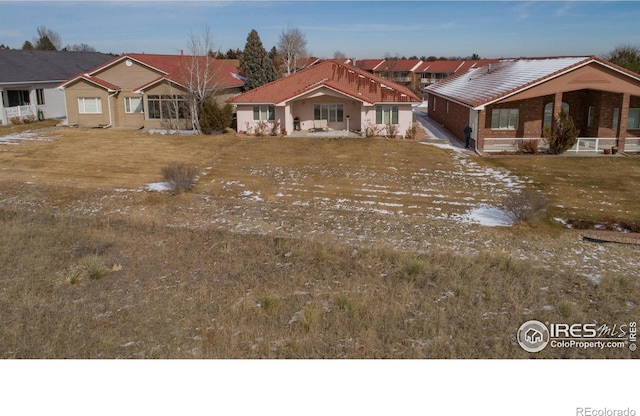 107 Fairway Ln, Fort Morgan, CO 80701 - ranch-style home featuring a tile roof