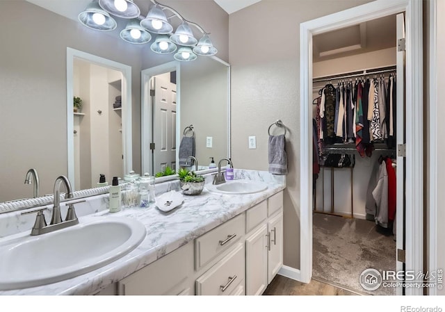 39 Sebring Ln, Johnstown, CO 80534 - full bathroom with a spacious closet and double vanity