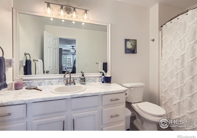 39 Sebring Ln, Johnstown, CO 80534 - bathroom featuring vanity, toilet, a shower with shower curtain, and ceiling fan