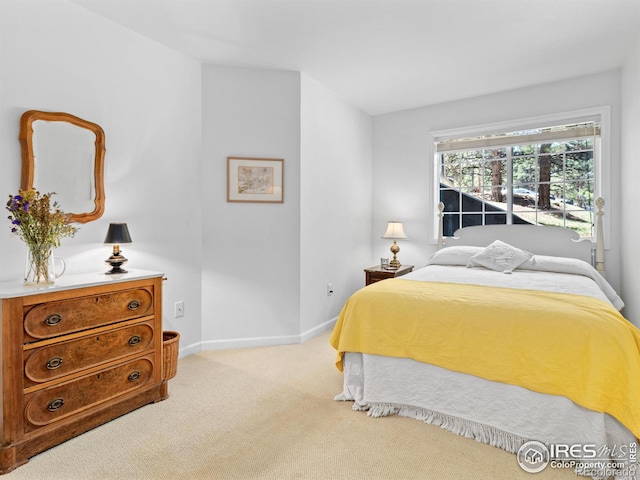 160 Riverside Dr Unit 2, Estes Park, CO 80517 - bedroom featuring light carpet and baseboards