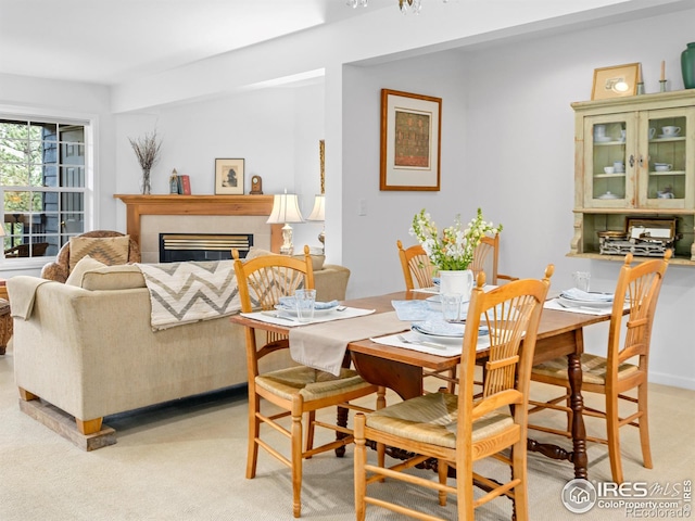160 Riverside Dr Unit 2, Estes Park, CO 80517 - dining space with a fireplace