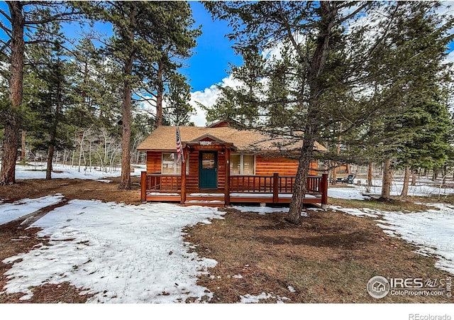 6 Norske Trl, Allenspark, CO 80510 - chalet / cabin featuring a deck and log veneer siding