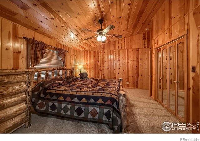 6 Norske Trl, Allenspark, CO 80510 - carpeted bedroom featuring vaulted ceiling, wood ceiling, and wood walls