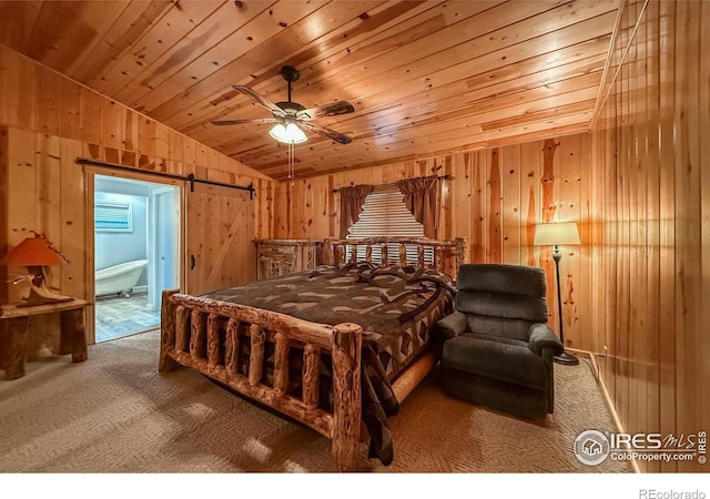 6 Norske Trl, Allenspark, CO 80510 - carpeted bedroom featuring vaulted ceiling, wooden ceiling, wooden walls, and ensuite bath