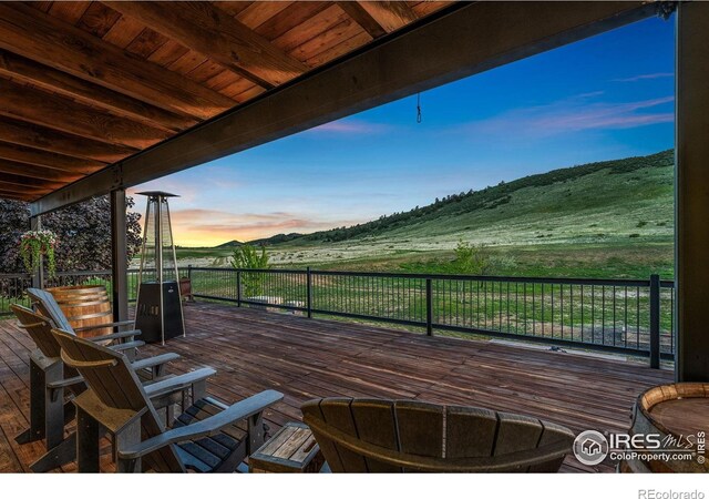 6950 W County Road 18, Loveland, CO 80537 - wooden terrace with a rural view