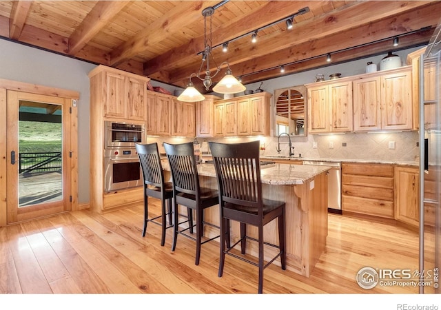 6950 W County Road 18, Loveland, CO 80537 - kitchen featuring stainless steel appliances, a sink, light brown cabinets, light wood finished floors, and wood ceiling