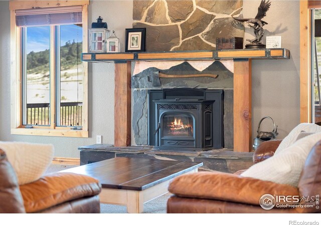 6950 W County Road 18, Loveland, CO 80537 - living area with a fireplace