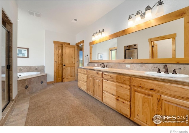 6950 W County Road 18, Loveland, CO 80537 - full bath featuring a bath, a shower stall, and double vanity