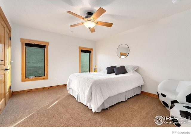 6950 W County Road 18, Loveland, CO 80537 - bedroom featuring carpet flooring, baseboards, and a ceiling fan