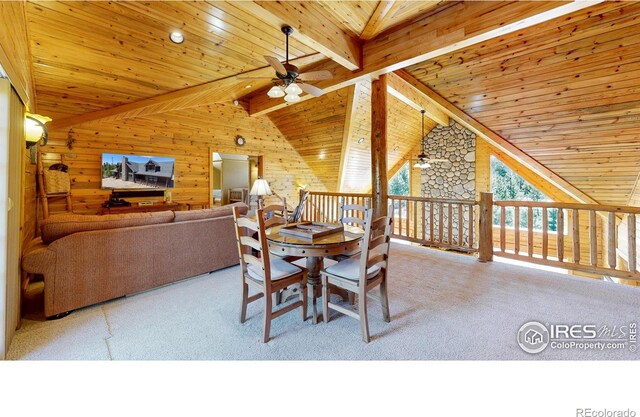 315 County Road 4454, Grand Lake, CO 80447 - dining space featuring a ceiling fan, wood ceiling, carpet flooring, and wood walls