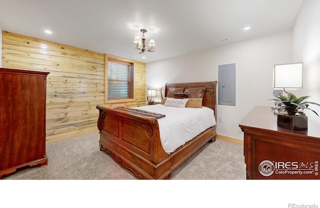 315 County Road 4454, Grand Lake, CO 80447 - bedroom featuring carpet, a chandelier, electric panel, wooden walls, and recessed lighting