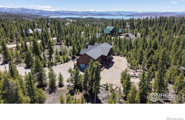 315 County Road 4454, Grand Lake, CO 80447 - view from above of property featuring a heavily wooded area and a mountain backdrop