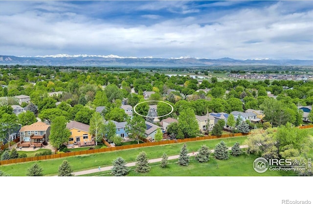 1724 Holeman Dr, Erie, CO 80516 - aerial view of a mountainous background