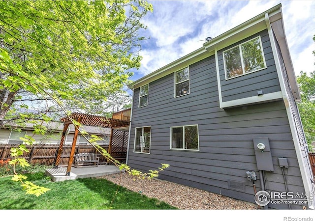 1724 Holeman Dr, Erie, CO 80516 - rear view of house featuring a patio