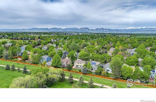 1724 Holeman Dr, Erie, CO 80516 - aerial view of residential area featuring a mountainous background