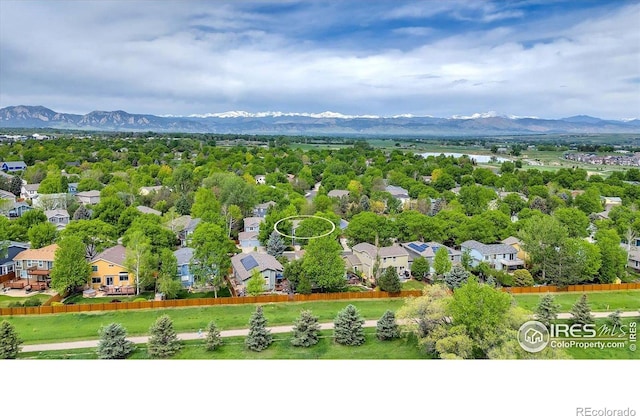 1724 Holeman Dr, Erie, CO 80516 - aerial view of residential area featuring a mountain backdrop