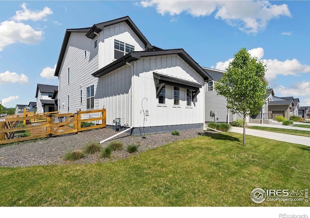 5085 Blanchette St, Timnath, CO 80547 - view of front of property with board and batten siding