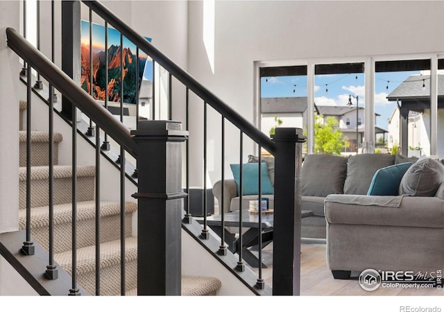 5085 Blanchette St, Timnath, CO 80547 - staircase with wood finished floors