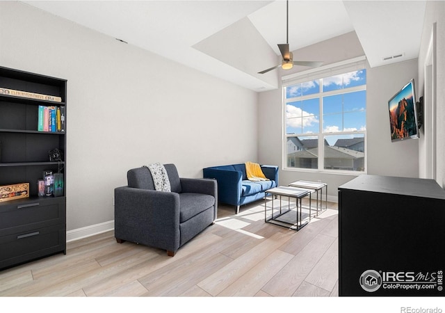 5085 Blanchette St, Timnath, CO 80547 - living room with light wood-type flooring, baseboards, and a ceiling fan