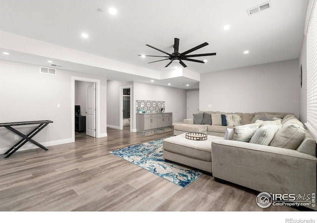 5085 Blanchette St, Timnath, CO 80547 - living room with ceiling fan, wood finished floors, recessed lighting, and baseboards